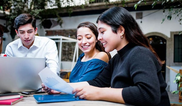 three-students-studying-at-table-courtesy-of-adobe-_original